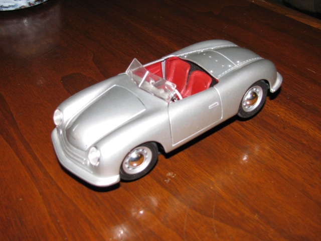 Click image for larger version

Name:	2.1948Roadster-SplitWindshield.JPG
Views:	37
Size:	173.8 KB
ID:	9077