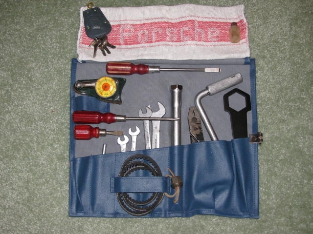 Click image for larger version

Name:	12-18-101.1961RoadsterToolKitwReproBagandGenWrench.JPG
Views:	44
Size:	184.4 KB
ID:	46115
