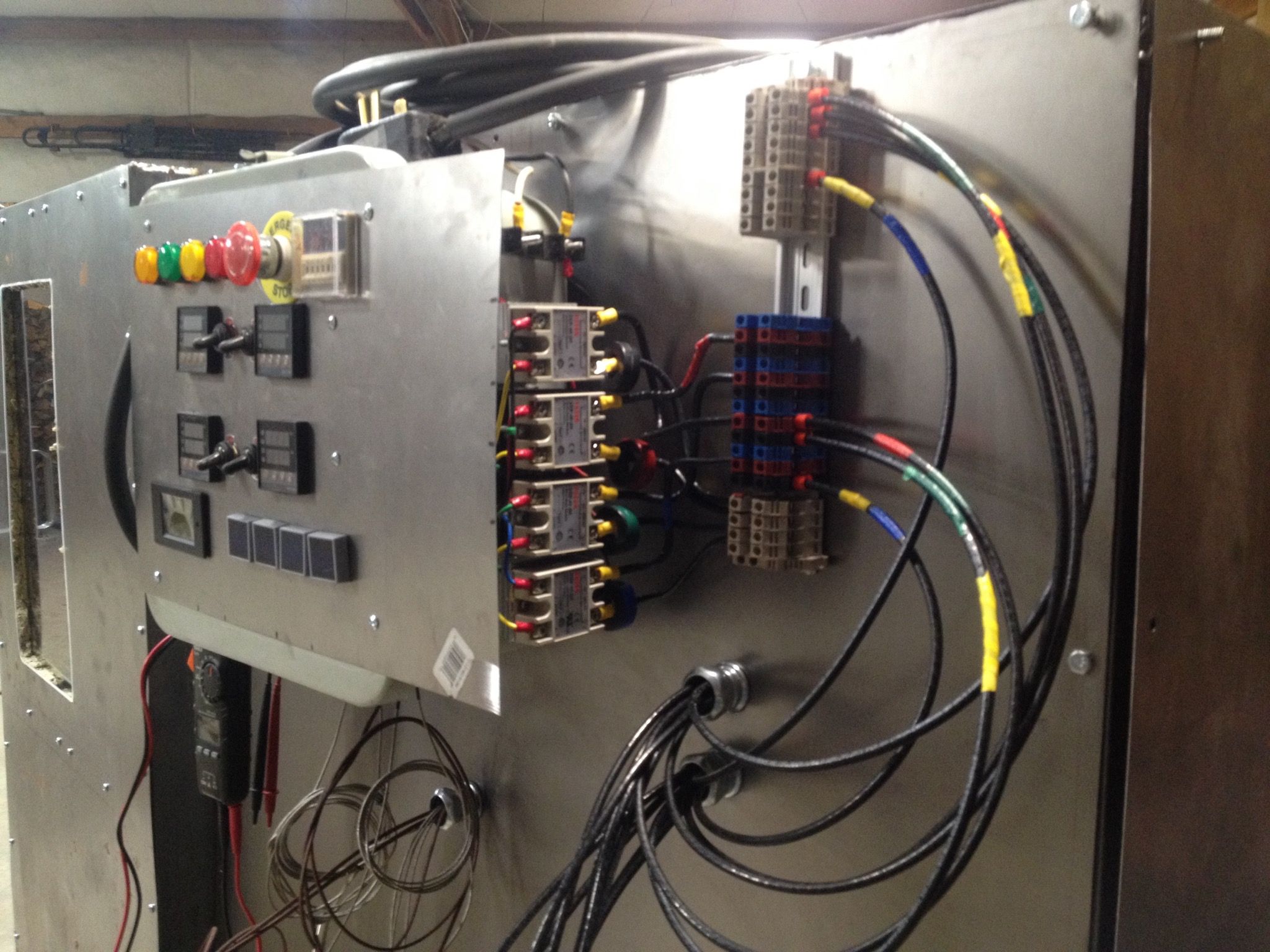 DIN rail and terminals for the heater circuits.