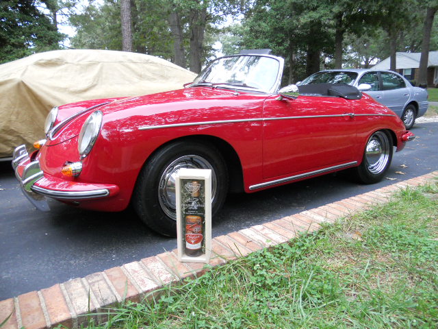 Click image for larger version

Name:	9.RoadsterBackHomeWithWineTrophy.jpg
Views:	49
Size:	163.5 KB
ID:	49415