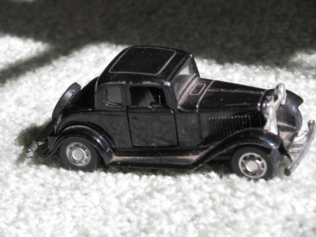 Click image for larger version

Name:	6-28-1258bModelof1932Ford5WindowCoupe.JPG
Views:	74
Size:	133.9 KB
ID:	54386