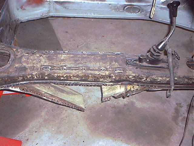 Click image for larger version

Name:	Floorpanseparatedfromcentertunnel.JPG
Views:	95
Size:	82.5 KB
ID:	74527